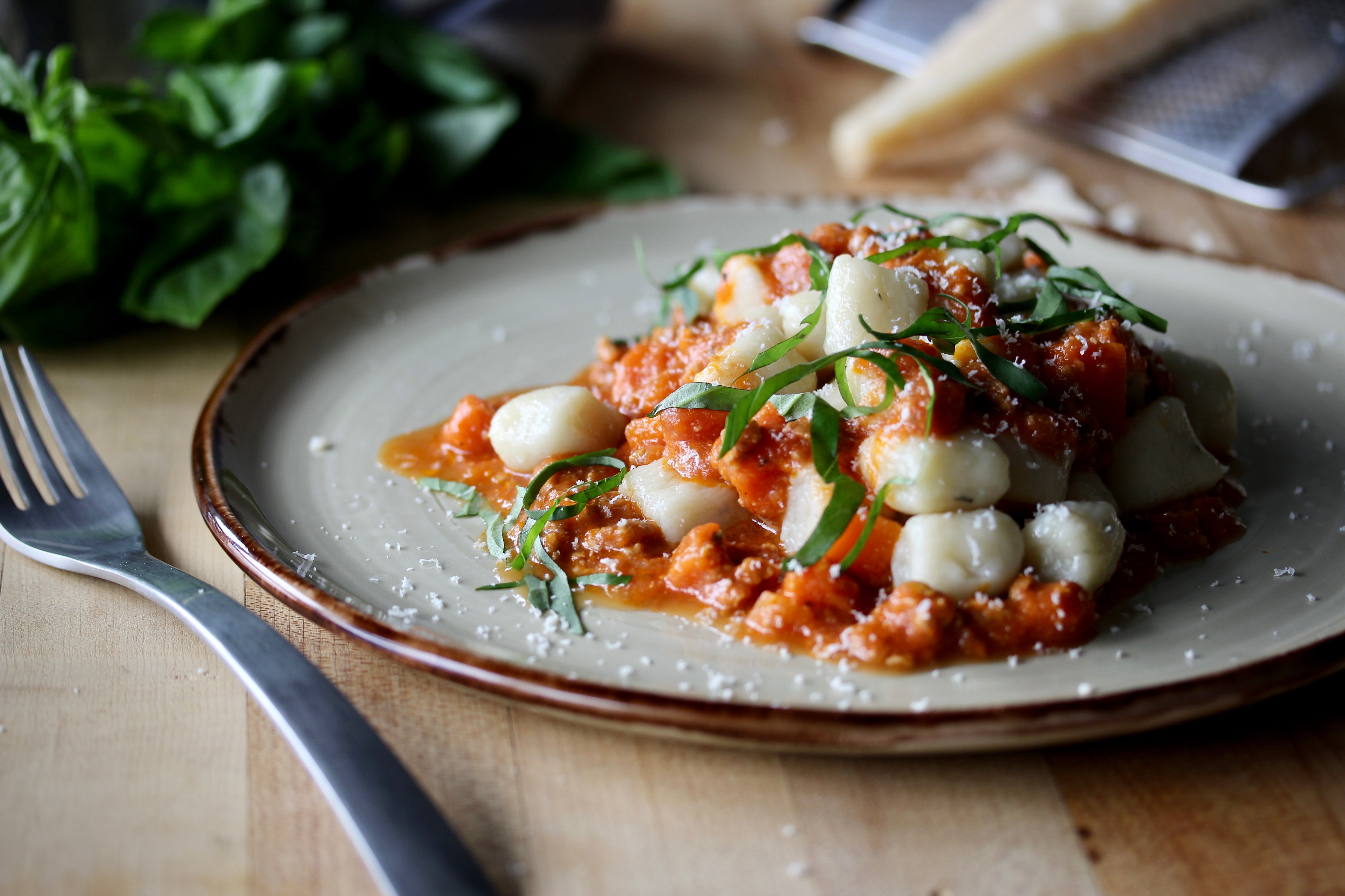 gnocchi bolognese fresh basil parmesan